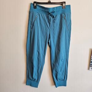 Athleta Teal Track Joggers with Zip Pockets